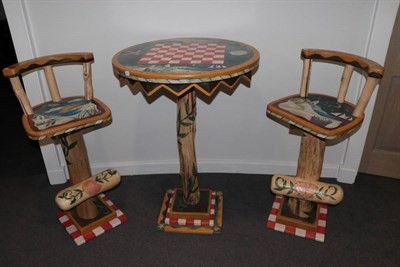 Lot 380 - A Canadian Chess-Top Pub Style Table, modern, the top painted with a seascape with a tree form...