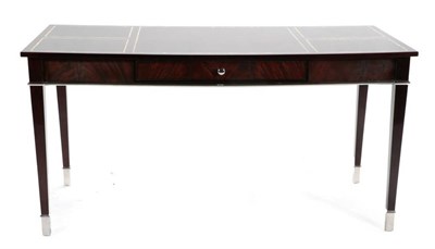 Lot 387 - A High Gloss Laminated Wood and Chrome Metal Mounted Writing Table, modern, of rectangular...