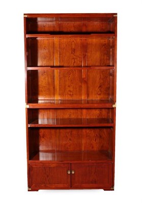 Lot 389 - Star Bay Furniture: A Marco Polo Indian Rosewood Bookcase, model *022, modern, in two sections,...