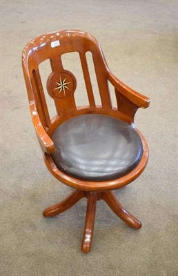 Lot 395 - Star Bay Furniture: A Normandy Revolving Desk Chair, model *033, modern, the back support...