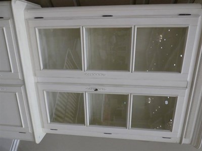 Lot 400 - A Laura Ashley Cream Painted Provençale Range Bookcase Cabinet, modern, with glazed doors...