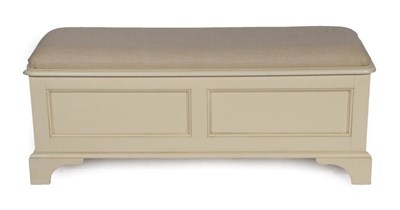 Lot 409 - A Laura Ashley Ivory Painted Clifton Range Box Ottoman, modern, with upholstered hinged seat...