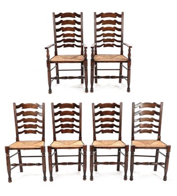 Lot 424 - A Set of Six Titchmarsh & Goodwin Oak Ladderback Rush Seated Chairs, modern, including two carvers
