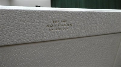 Lot 459 - Smythson of Bond Street: A Grosvenor Photograph Frame, bound in cream calf leather, 32.5cm by 27cm