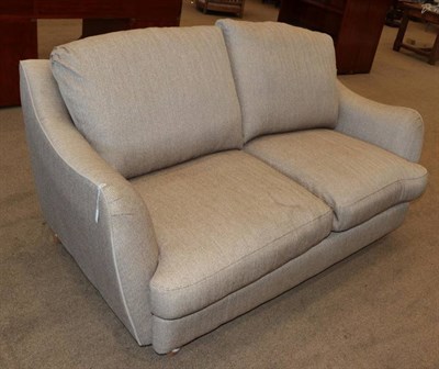 Lot 463 - A Two-Seater Sofa, retailed by House of Fraser, modern, upholstered in brown tweed-effect...