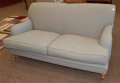 Lot 466 - Vanessa Arbuthnott: A Two-Seater Sofa, modern, upholstered in handwoven Harris tweed, on beech...