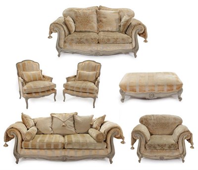 Lot 470 - A Two-Seater Sofa and Matching Armchair, modern, upholstered in cream floral fabric, with...