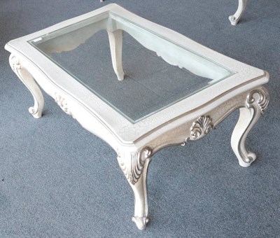 Lot 473 - A Glass Top Coffee Table, modern, painted en grisaille with crackle effect paint, the...