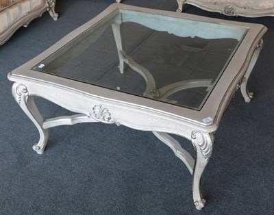 Lot 474 - A Glass Top Coffee Table, modern, painted en grisaille with crackle effect paint, the...