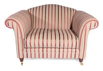 Lot 479 - Laura Ashley: A Snuggle Chair, circa 2014, upholstered in red and grey striped fabric, on Victorian