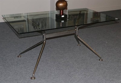 Lot 493 - A Glass Top and Metal Dining Table, by Calligaris, modern, the rectangular top on a polished...