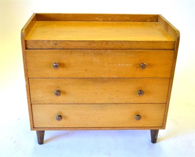 Lot 499 - Gordon Russell of Broadway: A 1940's Oak Three Drawer Straight Front Chest, with three-quarter...