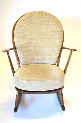 Lot 506 - An Ercol Classics Style Ash Framed Rocking Chair, upholstered to match the preceding lot, with...