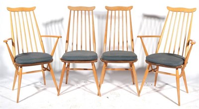 Lot 508 - A Set of Eight Ercol Beech Stick-Back Dining Chairs, with elm seats, including two carvers, singles