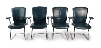 Lot 517 - A Set of Four 1970's Chrome Cantilever and Blue Leather Armchairs, labelled Green Flag Group...