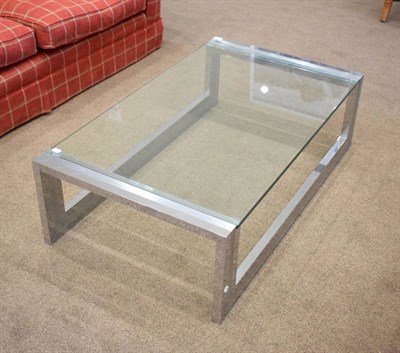 Lot 518 - A 1970's Chromed Metal Glass Top Coffee Table, of rectangular form with square tubular frame, 120cm