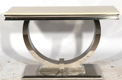 Lot 525 - A 1970's Polished Metal Console Table, of rectangular form, the marble top on a curved support...