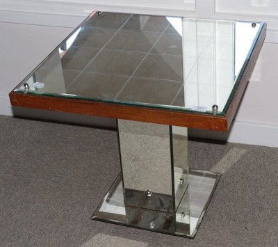 Lot 527 - A 1960/70's Glass Top Occasional Table, of square form, the mirrored top mounted on an timber frame