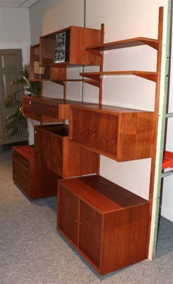 Lot 532 - A 1960's Danish PS System T-Line Teak Modular Shelving System, with original sales brochure