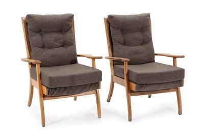 Lot 545 - A Pair of 1950's Parker Knoll 725 Armchairs, recovered in grey buttoned fabric, with removeable...