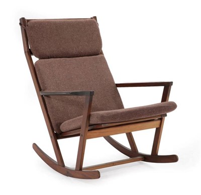 Lot 548 - Poul Volther for Frem Rojle: A Scandinavian 1960's Teak Framed Rocking Chair, with brown fabric...