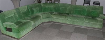 Lot 556 - Roche-Bobois: A 1970's Corner Lounge Suite, upholstered in lime green suede, in five sections,...