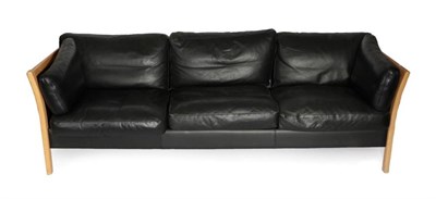 Lot 564 - A Danish Friss Three-Seater Sofa, upholstered in black leather, with eight cushions and leather...