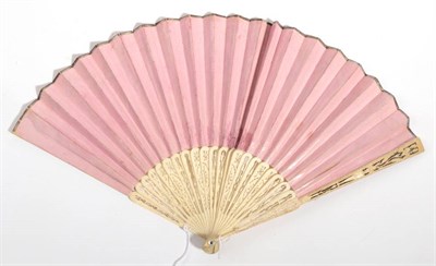 Lot 2001 - A Late 18th or Early 19th Century Bone Fan, classically carved and pierced. The double leaf, of...