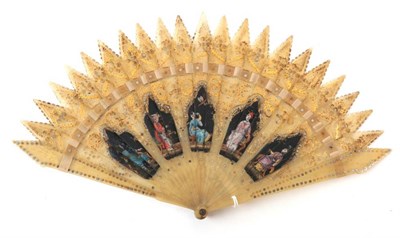 Lot 2038 - A Gothic Style Horn Brisé Fan, early 19th century, with trefoil head. The twenty-one inner...
