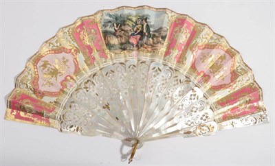 Lot 2057 - A Mid-19th Century Fan, the heavy monture of pierced and gilded white mother-of-pearl, mounted with