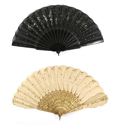 Lot 2060 - A Circa 1830's or 1840's White Mother-of-Pearl Fan, the monture carved, pierced, gilded and...