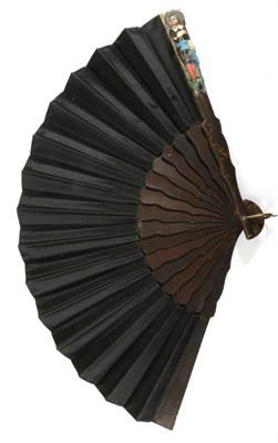 Lot 2077 - A 19th Century Wooden Fan, possibly Bavarian, the leaf of plain black silk mounted onto black...