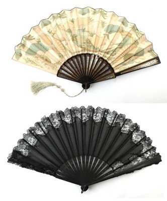 Lot 2081 - A Late Victorian Fabric Fan, mounted on black wooden sticks, with unusual gold and ice blue...