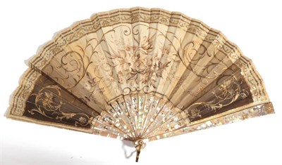 Lot 2082 - An Early 20th Century Pink Mother-of-Pearl Fan, the monture gilded and silvered, the silk leaf...