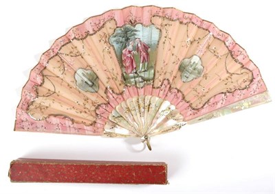 Lot 2085 - An Early 20th Century Fan, the monture of pale pink mother-of-pearl, silvered and gilded and carved