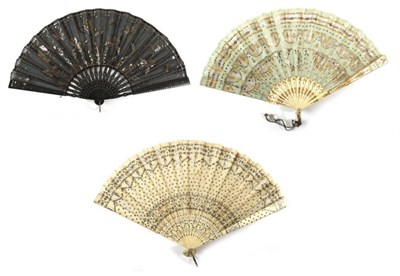 Lot 2087 - An Early 20th Century Sequin Fan, the pale green silk leaf mounted on bone, the sequins in gold and