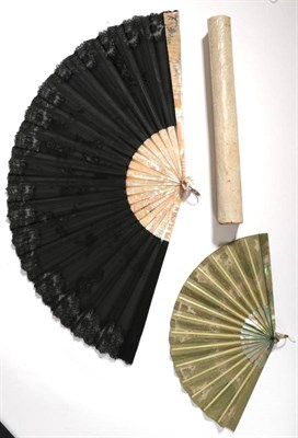 Lot 2095 - An Early 20th Century Mid Green/Pink Mother-of-Pearl Fan, the shell with attractive shading,...