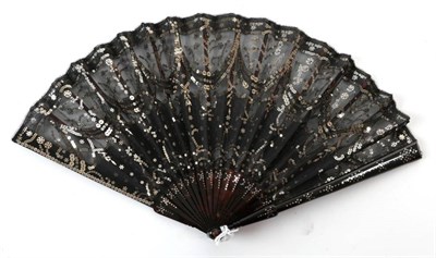 Lot 2100 - A Circa 1905 Tortoiseshell Fan, the monture piqué, the black gauze leaf decorated in swags...