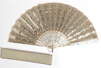 Lot 2104 - A Circa 1900 White Mother-of-Pearl Fan, the heavy monture clouté in silver in regular designs. The