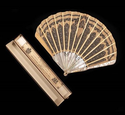 Lot 2105 - An Elegant Circa 1900 Fan, the silver gauze leaf of palmette form, applied with a strong ivory...