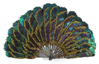 Lot 2139 - A Fine 19th Century Feather Fan, the mother of pearl monture almost iridescent in shades of...