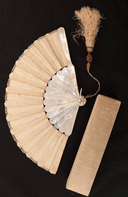 Lot 2153 - An Unusual Circa 1880's White Mother-of-Pearl Fan, the monture overlaid à la Sultane, lightly...