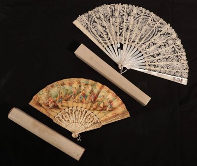 Lot 2162 - An Early 20th Century Brussels Mixed Lace Fan, the leaf mounted on white mother of pearl, the upper
