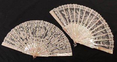 Lot 2166 - A Circa 1870's Fan, with a handmade lace leaf mounted on pink mother-of-pearl sticks and ribs,...