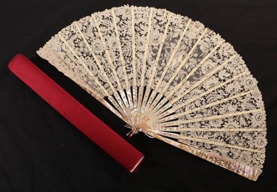 Lot 2167 - A Brussels Mixed Lace Fan, circa 1890's, the monture of carved and gilded pink mother-of-pearl. The