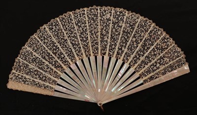 Lot 2168 - A Circa 1880's Fan of Green/Pink Mother of Pearl, the monture unadorned save for a line detail...