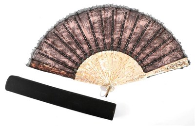 Lot 2172 - A Circa 1880's Pink Mother-of-Pearl Fan, the monture elaborately carved, the gorge also...