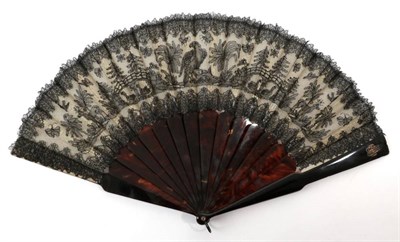 Lot 2173 - A Fine Circa 1880's Figurative Black Chantilly Lace Fan, the leaf mounted on Tortoiseshell, the...