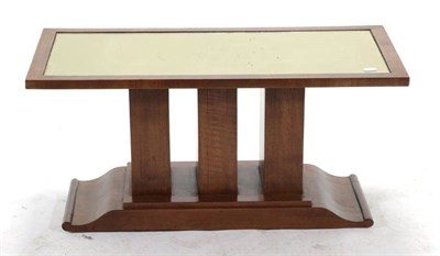 Lot 570 - A 1930s Walnut Coffee Table, of rectangular form, with original mirror plate top, raised on...