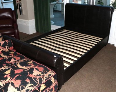 Lot 572 - Dark Brown Faux Leather Double Bedstead, modern, 146cm by 230cm by 108cm
